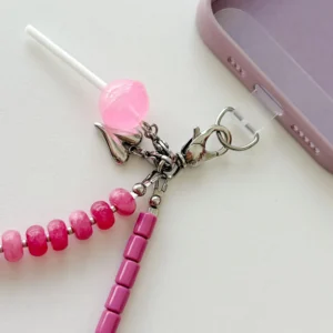 Close-up of stainless steel clasp and charm on Candy Blossom wristlet