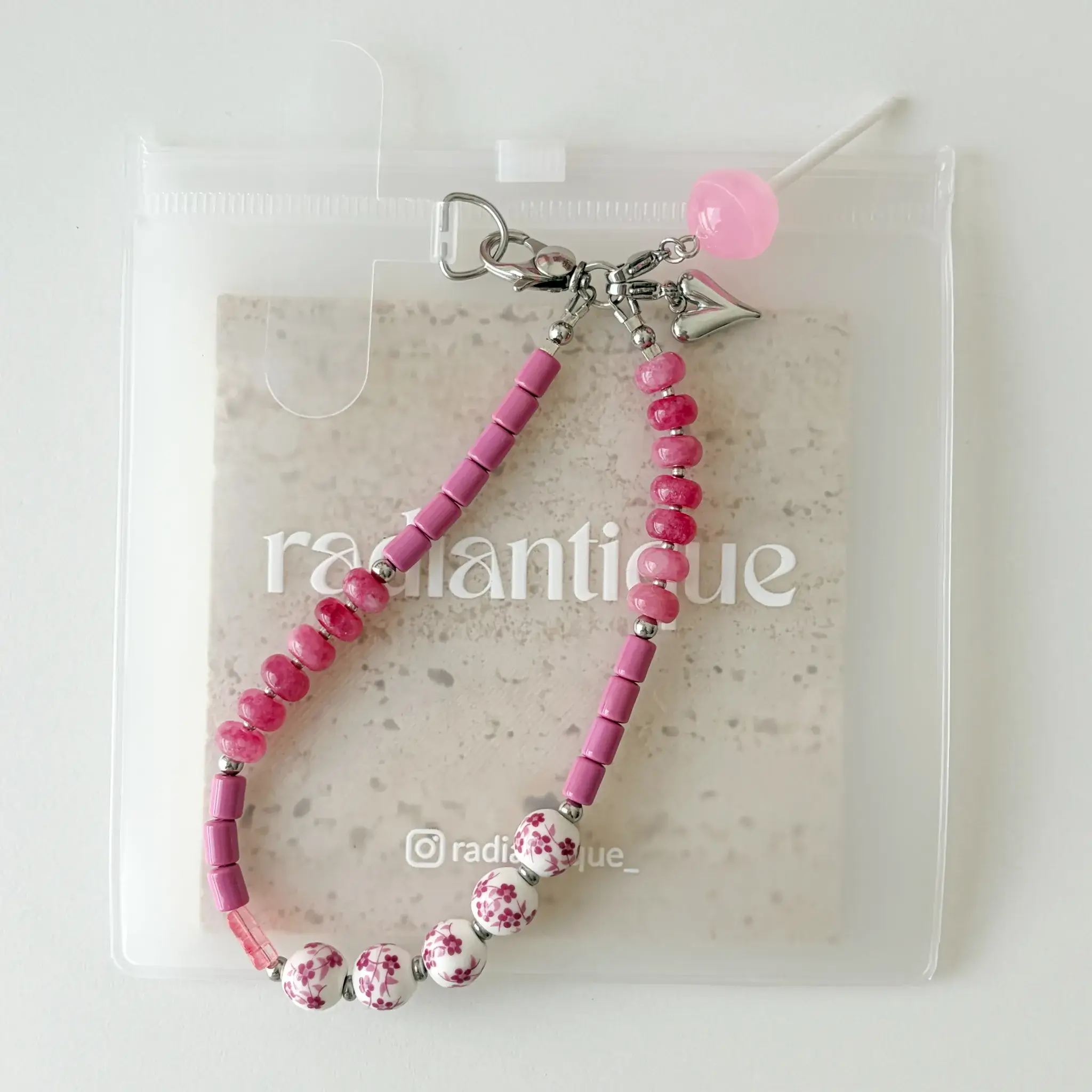 Vertical flat lay view of Candy Blossom beaded phone strap